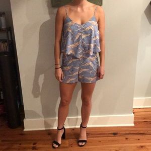 Periwinkle romper with bird pattern